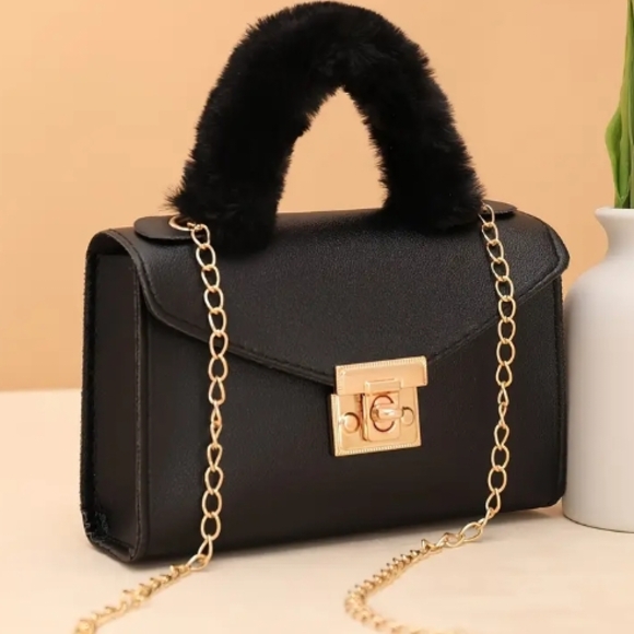 Elegant Black Handbag with Gold Accents - Picture 2 of 4